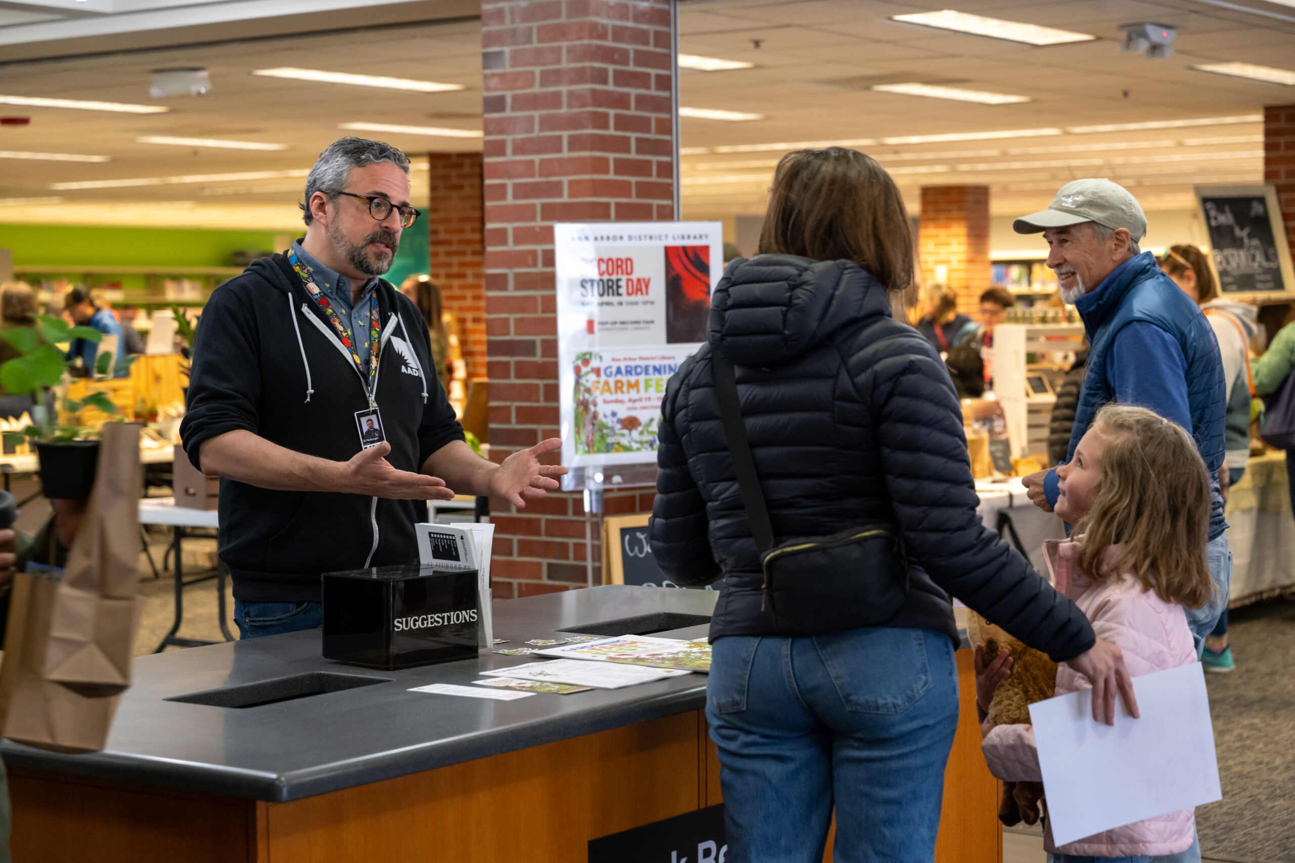 Eli Neiburger answers the question of a mom and child at the AADL.