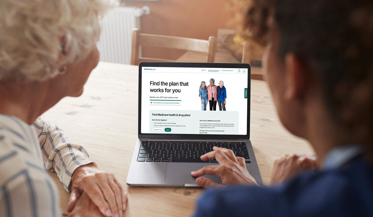 Senior Women Using Laptop Website