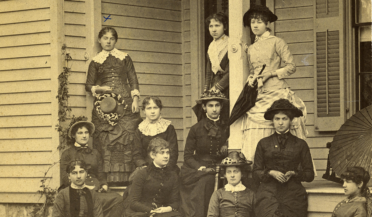 U-M female students, including Bertha Van Hoosen, circa 1883 on an unidentified porch