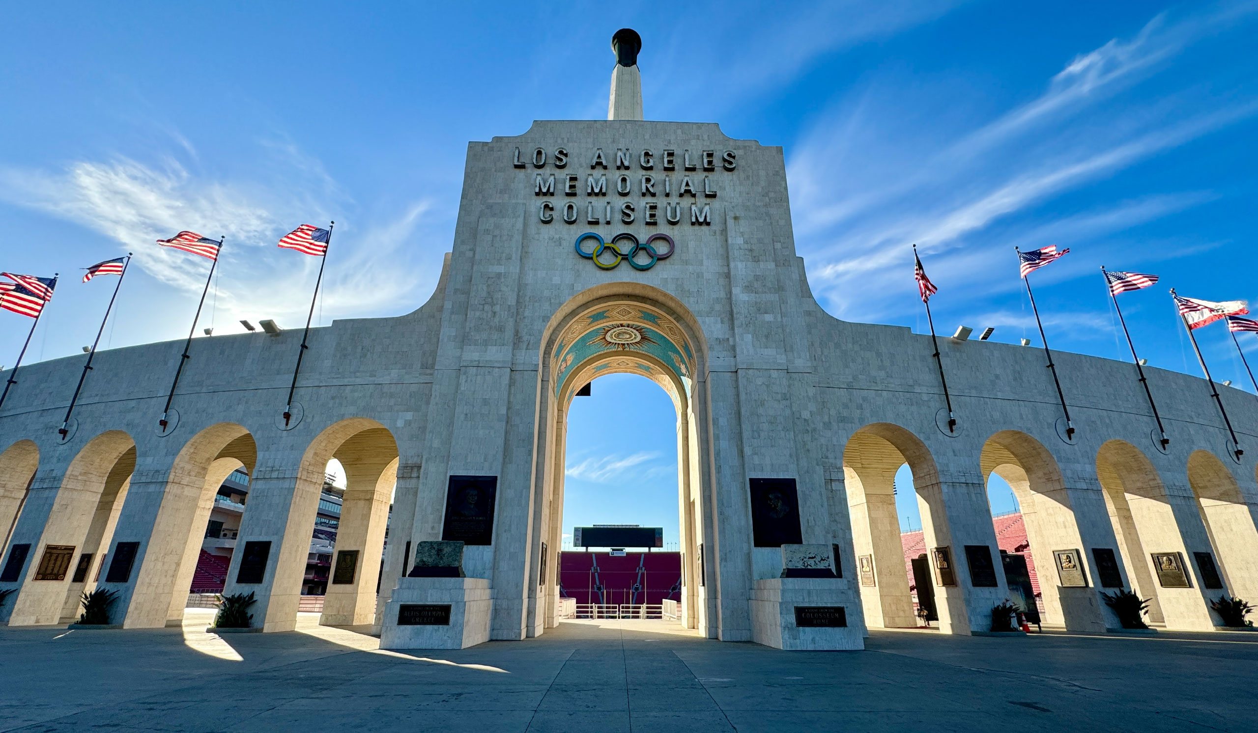 The Los Angeles Memorial Coliseum, featuring the end with the torch and Olympic rings.