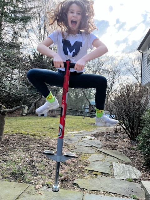 Hailing from New Haven, Conn., the 10-year-old daughter of Mark Beitel, ’94, couldn’t help but bounce with joy while wearing her Block M t-shirt she got during a trip to Ann Arbor.