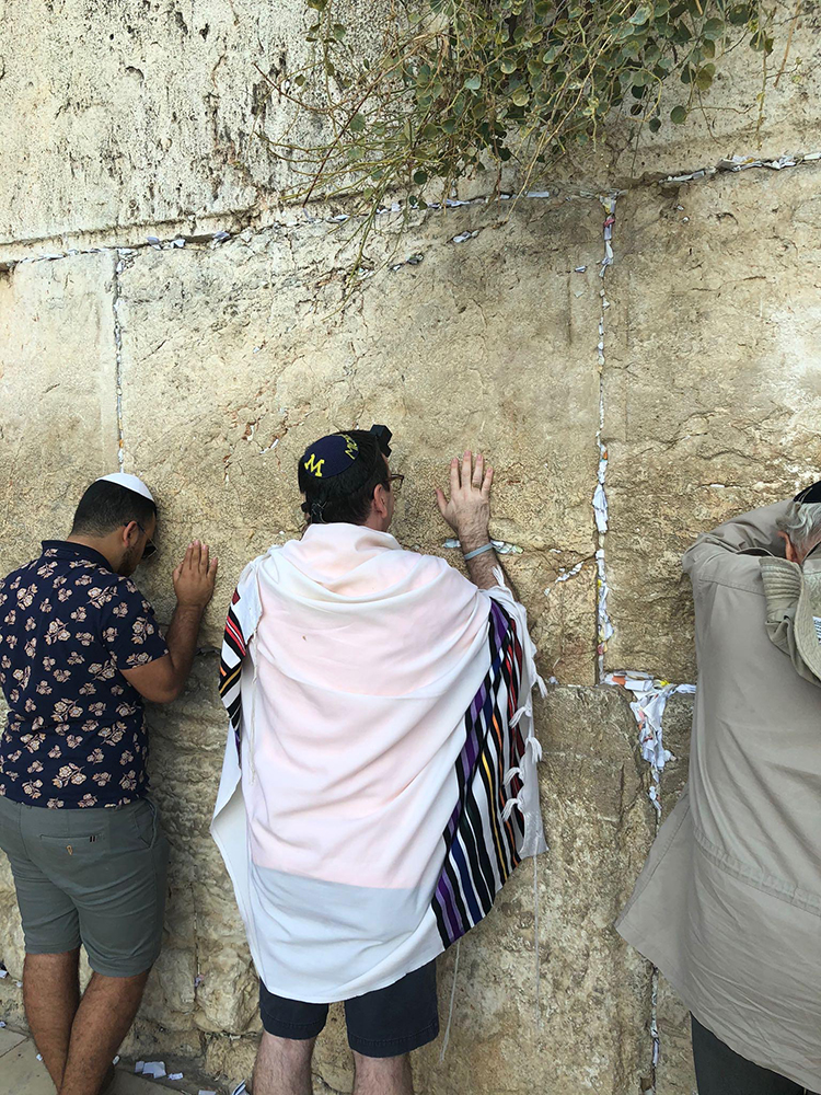 Marc Betman, ’88, prayed at the Western Wall of Jerusalem while keeping U-M near.