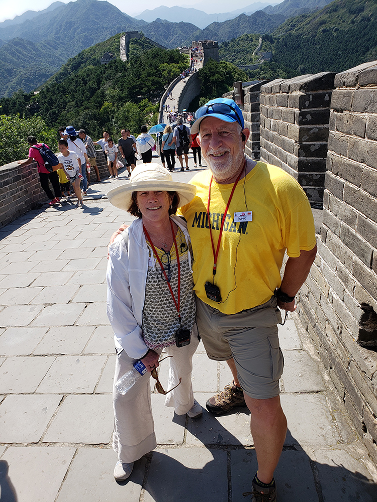 David Bloom, ’71, and his wife Christie Bloom posed on the Great Wall of China just before the Notre Dame football game began.