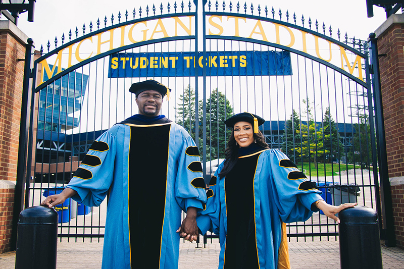 Nicholas A. Glenn, MS’20, PhD’23 (left), and Sydney L. Carr, MA’20, PhD’23, met as first-year doctorate students at U-M in 2018 and completed their Ph.D.s simultaneously, taking a snapshot of the memory together at the Big House last year. They married in Boston in July.