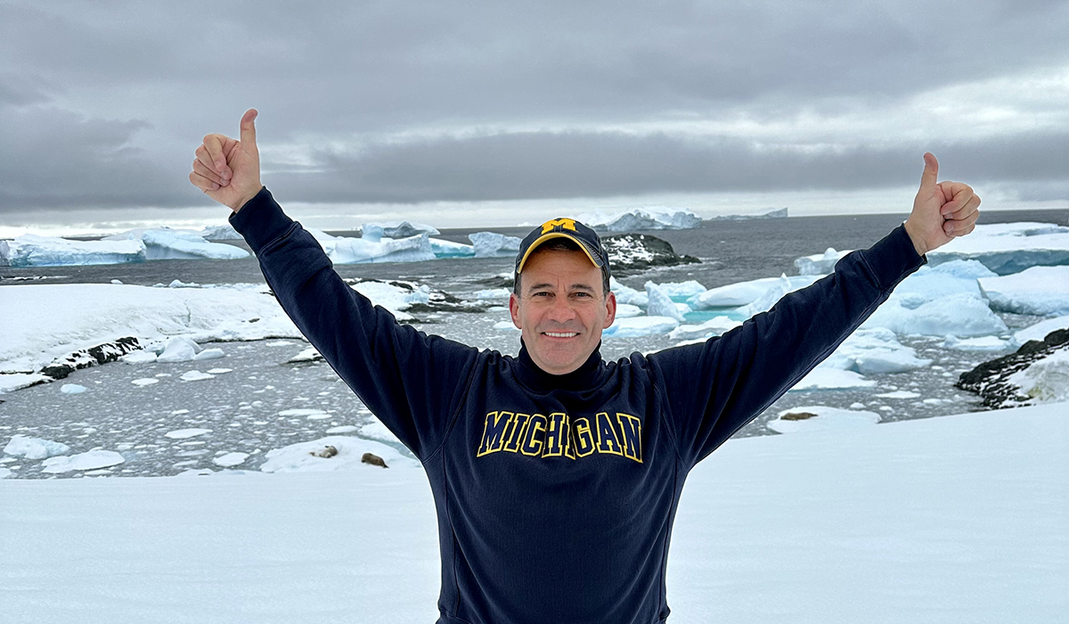 Peter Constance, ’83, carried the Wolverine spirit below the Antarctic Circle on a yacht-style cruise with his partner of 19 years, Terry Stroup.