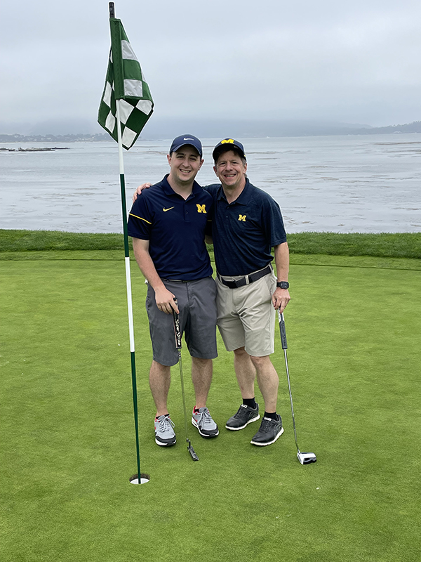 Corey, ’19, and Rick Esterow, MBA’86, showed their “M” pride at Pebble Beach, California.