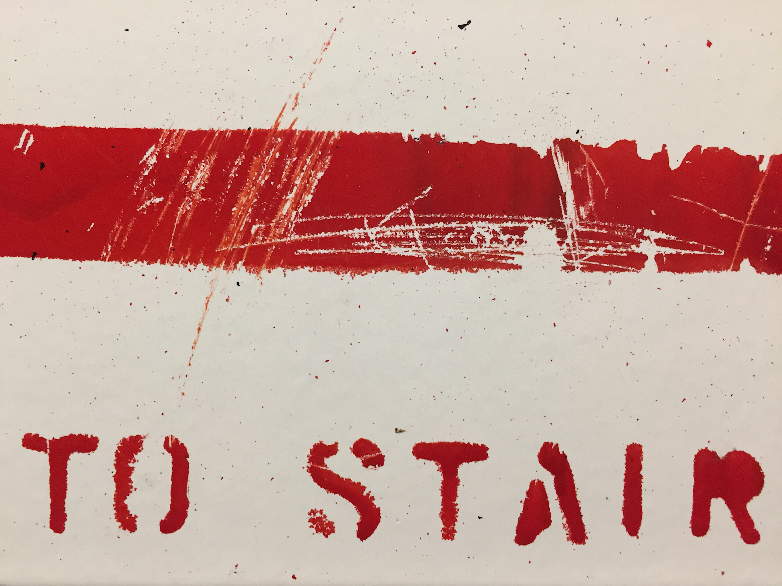 Close-up image of "To Stair" wall sign
