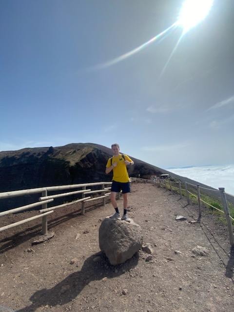 Dylan DeStefano-Raskin, ’22, MACC’23, took the Maize and Blue to the top of Mount Vesuvius in Italy.