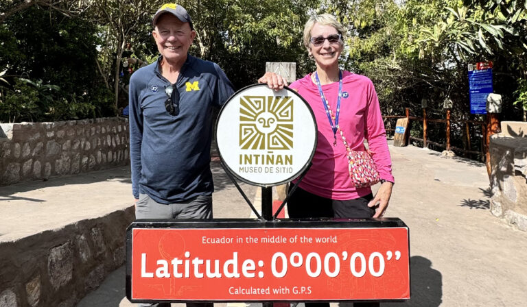 Making U-M the center of the world for a little bit, FRED, JD’77, and Kay Fathe took the Maize and Blue spirit to the equator near Quito, Ecuador, during a recent trip.