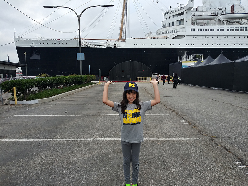 Stella, the daughter of Dana Gresko, ’04, helped keep the Queen Mary afloat in Long Beach, California.