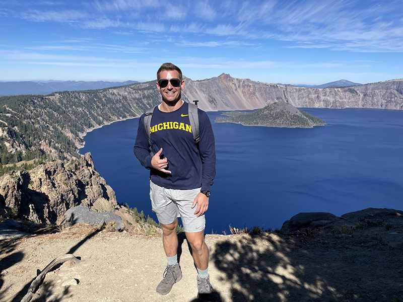The clear blue water of Oregon’s Crater Lake National Park was the perfect backdrop for Matthew Gross, ’06, to express his Maize and Blue pride.