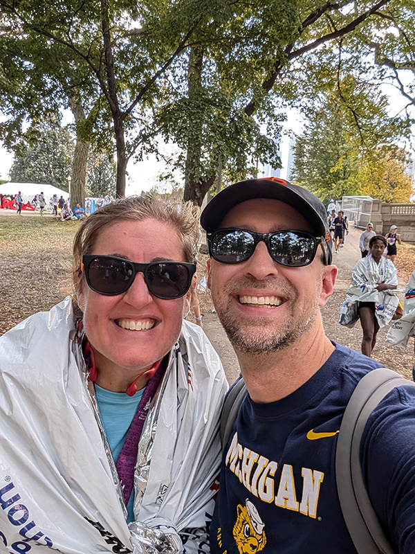 Husband and wife James Henderson, ’05, and Rachel Henderson, ’05, MS’10, posed for a celebratory photo at the end of the 2024 Chicago Marathon in October.