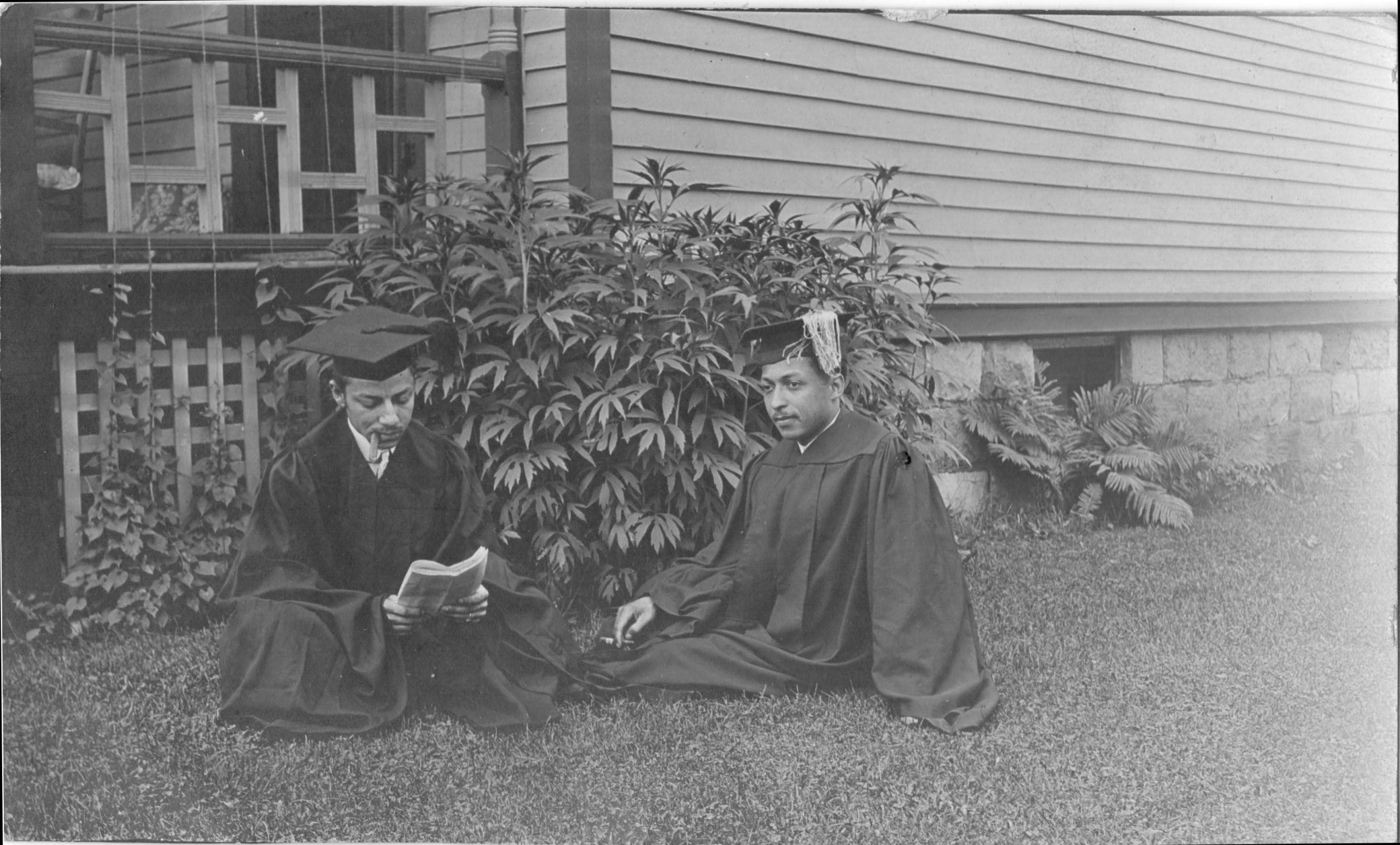 Photo of Unidentified Males in front of maple tree