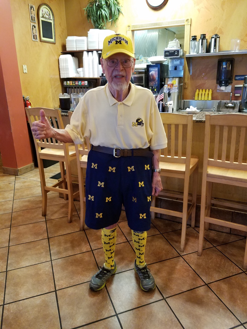 Retired dentist Ron Huey, DDS’55, likes to rile up his mostly green-and-white breakfast club with his a-maize-ing outfits in Milford, Michigan.