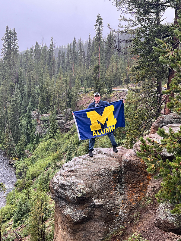 Toby Igo, ’22, flew the Maize and Blue as he traveled the western U.S., including treks through the North Rim of the Grand Canyon, Grand Teton National Park, and Yellowstone National Park (pictured).