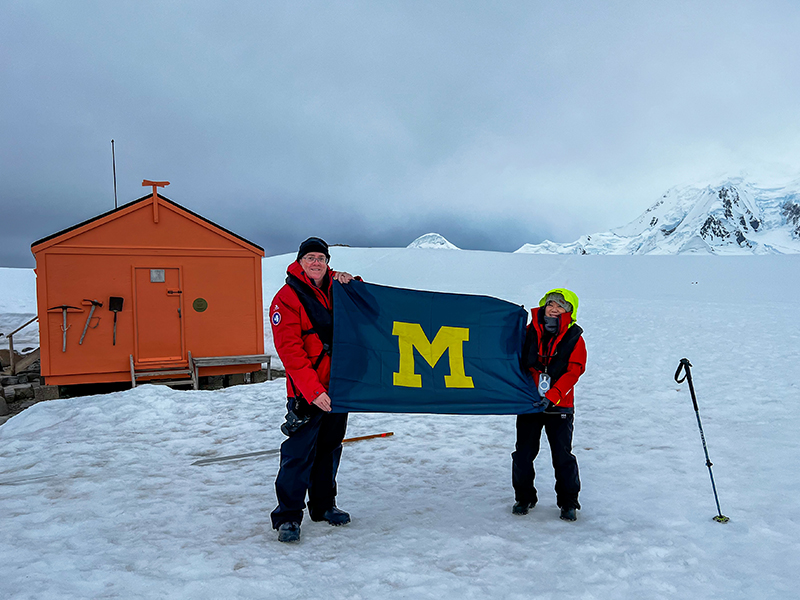 Keith, ’85, and Barbara Williams, ’85, were proud to display the U-M flag at Damoy Point in Antarctica during a February trip.
