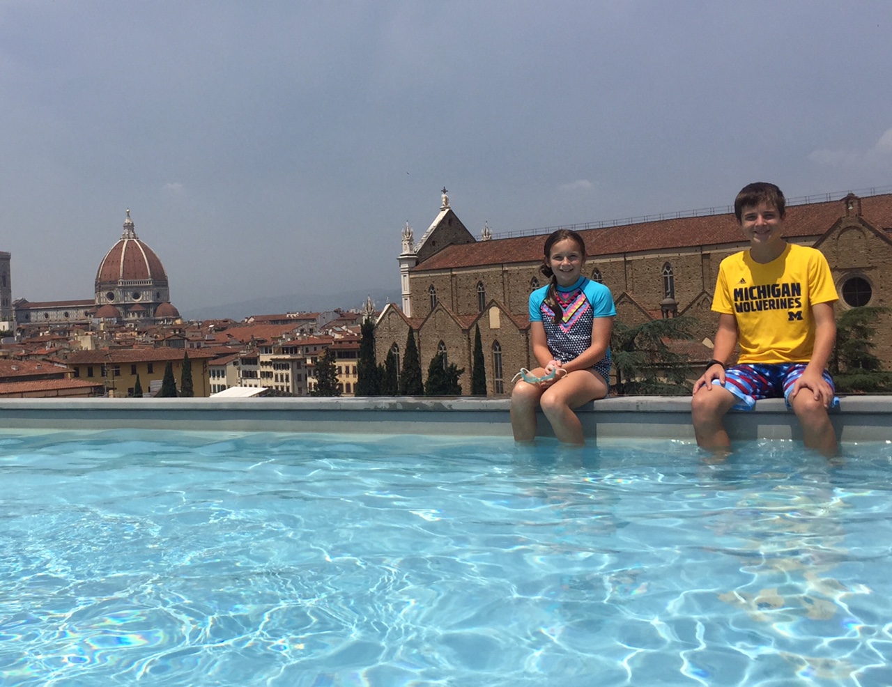 Josh and Kaylee Kraver, children of Tina Kraver, PHARMD’90, enjoying a view of the Duomo from the rooftop of their Florence, Italy hotel.
