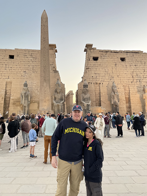 Matt, ’95, and Nhu Kurth shared their Maize and Blue pride at the Luxor Temple in Luxor, Egypt in February.