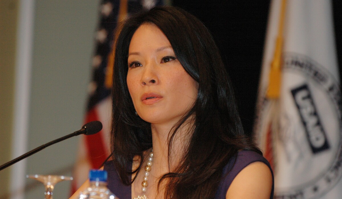 Lucy Liu speaking at the USAID Human Trafficking Symposium on Sept. 16, 2009