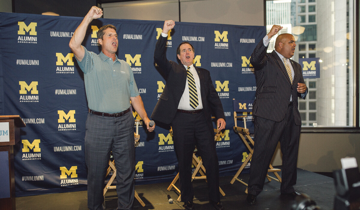 Jim Harbaugh, Steve Grafton, and Warde Manuel at an event