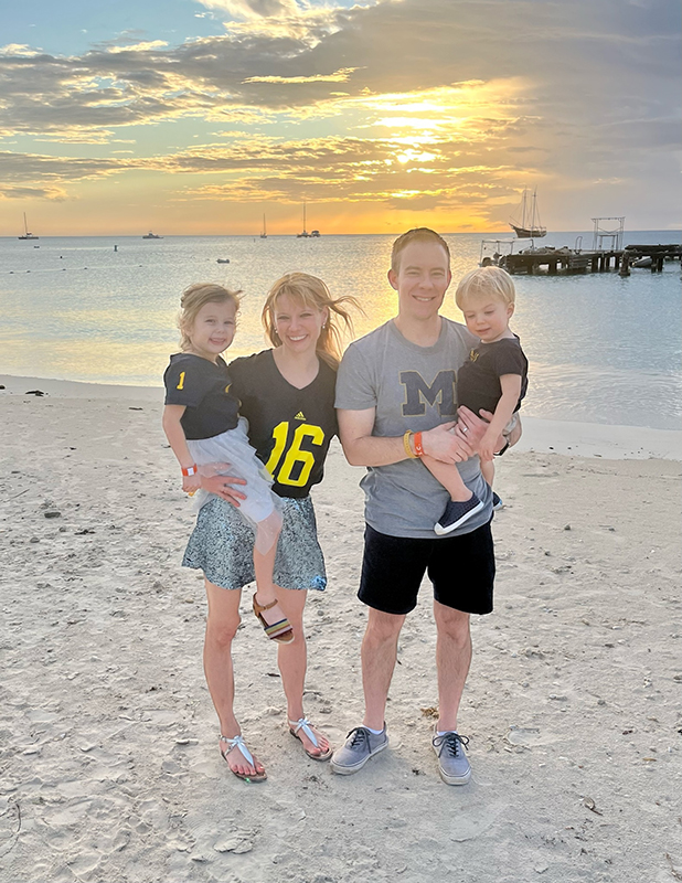 Lindsay Madejski, ’09, her husband, Nick, and future Wolverines, Felicity and Lucas, sport their Maize and Blue best to cheer on U-M in the Fiesta Bowl last year and celebrate New Year’s Eve on Aruba’s Palm Beach.