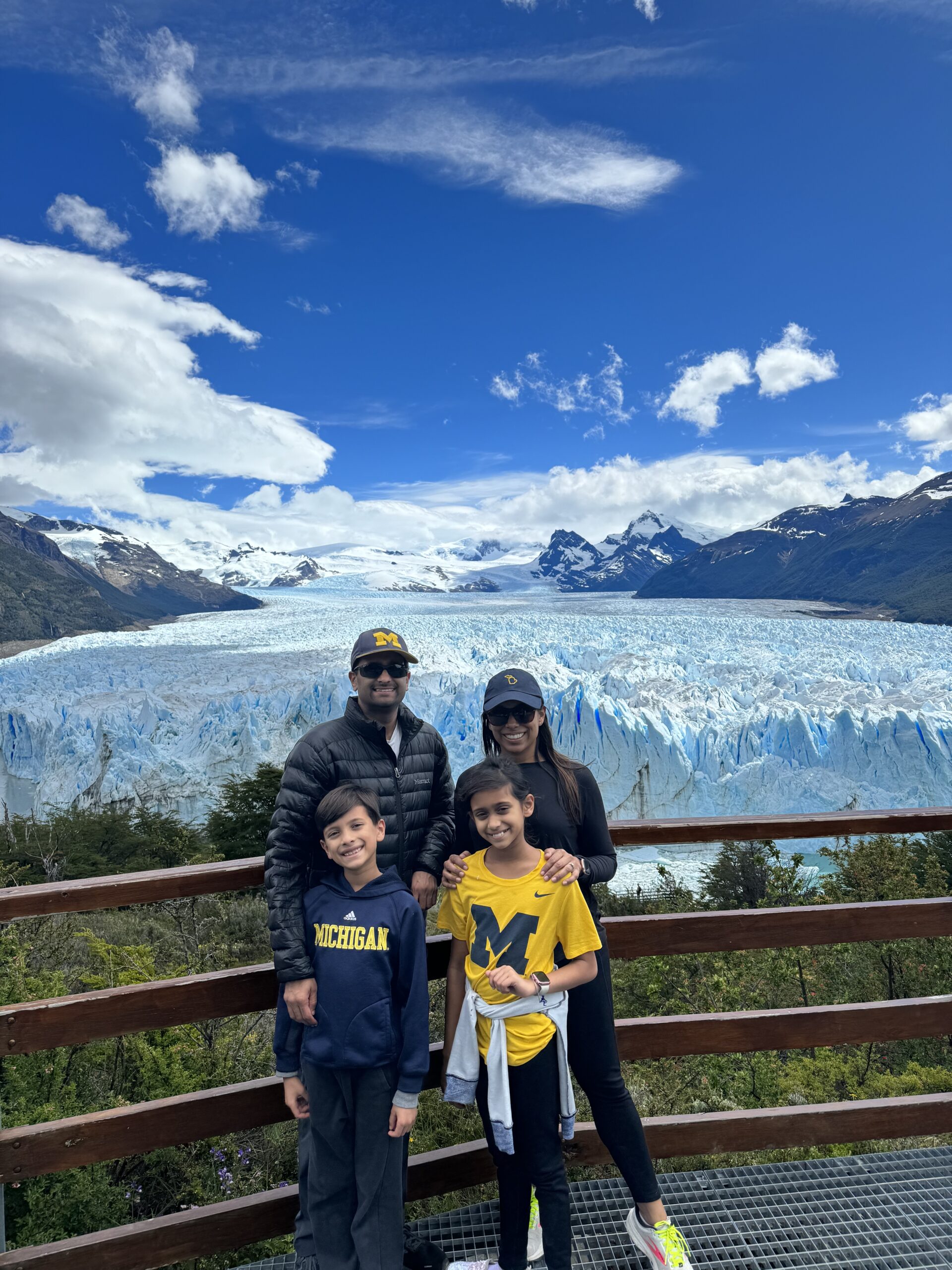 The family of Smita and Ankur Mehta, ’04, took a trip to South America’s Patagonia region and took an incredible photo with the Perito Moreno Glacier. Later, in their hotel room, they watched U-M defeat the University of Alabama in the Rose Bowl.