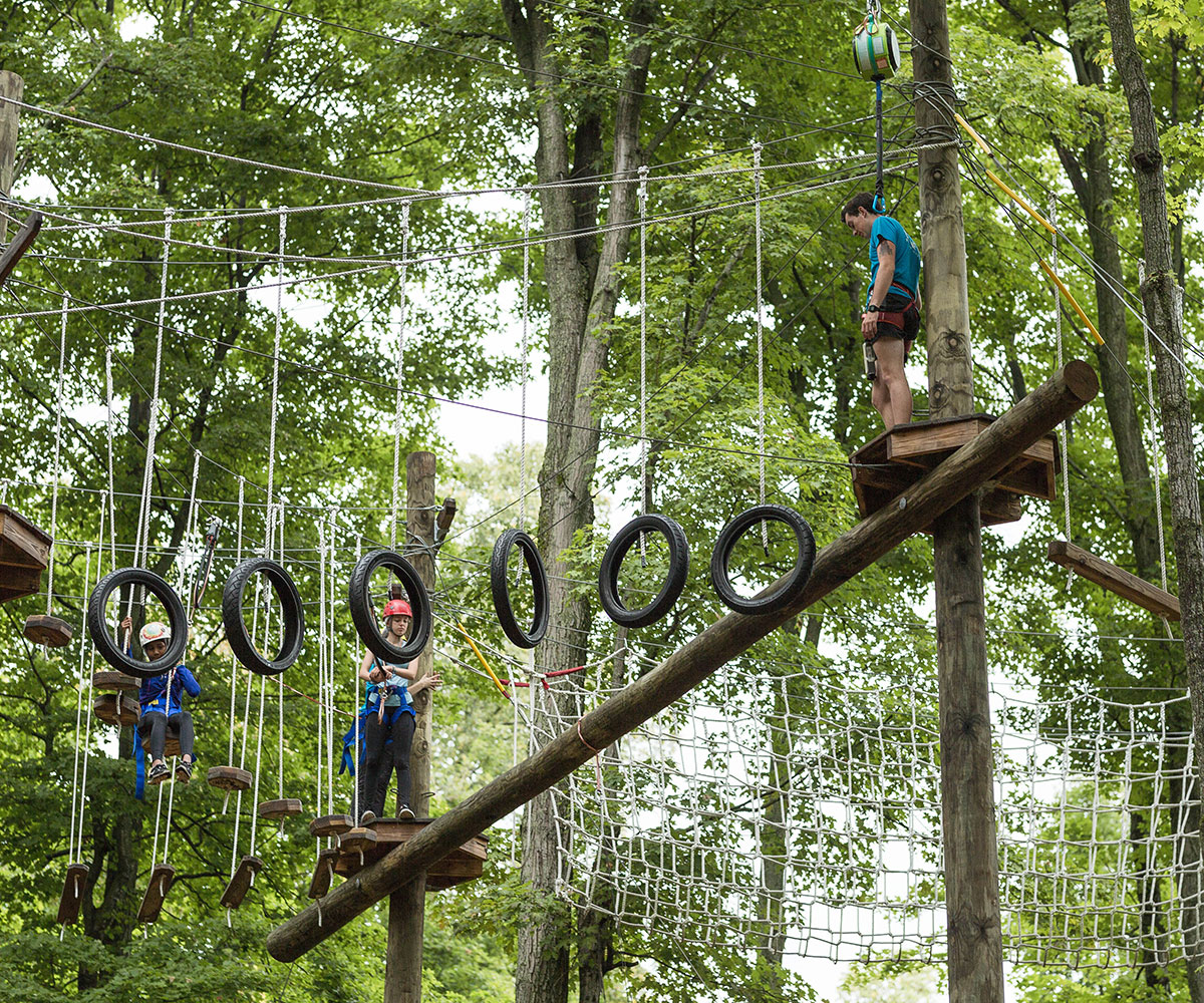 People on the ropes course at Camp Michigania