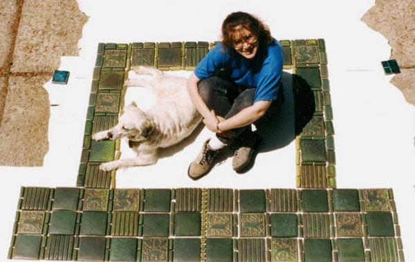 Motawi surrounded by her tiles
