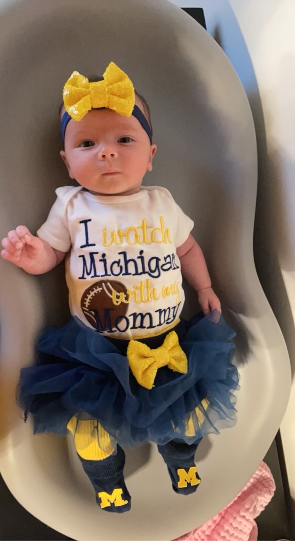 Jodi, ’85, and Kevin Neff, ’84, sent in this picture of their granddaughter, Blake, partaking in the Maize and Blue spirit. Blake’s parents are Jodi and Kevin’s son Adam Neff and his wife Melissa Neff, ’09.