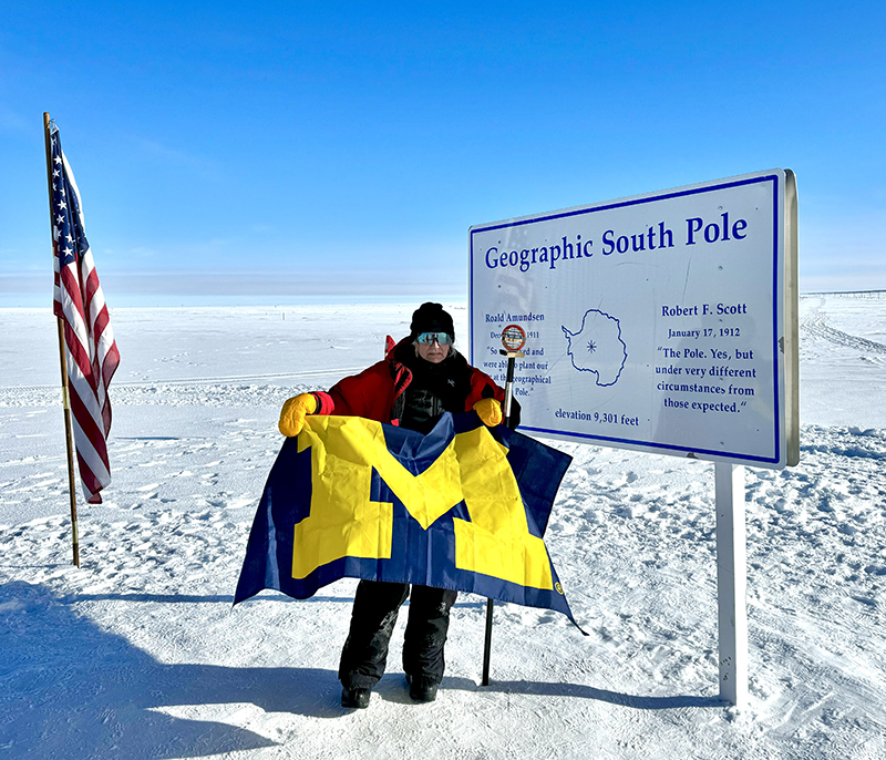 Former U-M regent and frequent traveler Andrea Fischer Newman, ’80, represented the Maize and Blue at the South Pole.