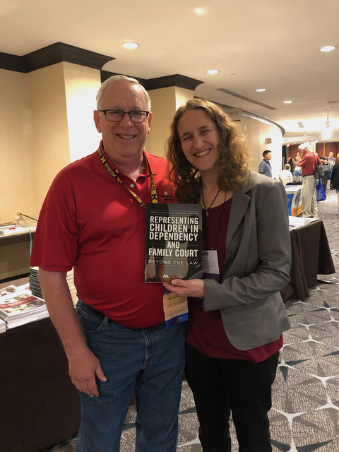 Phil And Rebecca With Their Book 2018