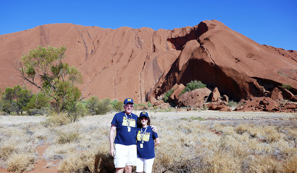 Scott, ’69, MBA’71, and Gay Pleune, ’68, celebrated their 50th wedding anniversary on a U-M Alumni Travel trip through Australia and New Zealand. The couple, who first met at a 1965 mixer in the Michigan Union, showed off their matching T-shirts in front of the Uluru/Ayers Rock.