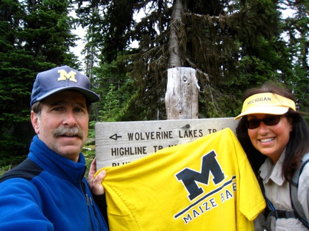 Larry Prussack, ’76, and Mimi Prussack, ’77, enjoying the trail to Wolverine Lake in northwest Montana.