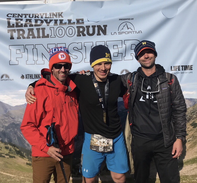 Brian Resutek, ’02 (middle), completed the Leadville 100 mile trail run in Colorado and reunited with his freshman dorm mate Todd Lohrmann, ’02 (right), who helped with his pacing for a portion of the race, and Steve Gotfredsom.