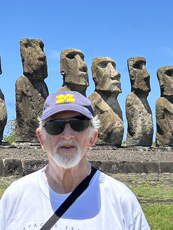 Miriam (behind the camera) and Peter Roos, ’64, took in the sight of the maoi of Easter Island.
