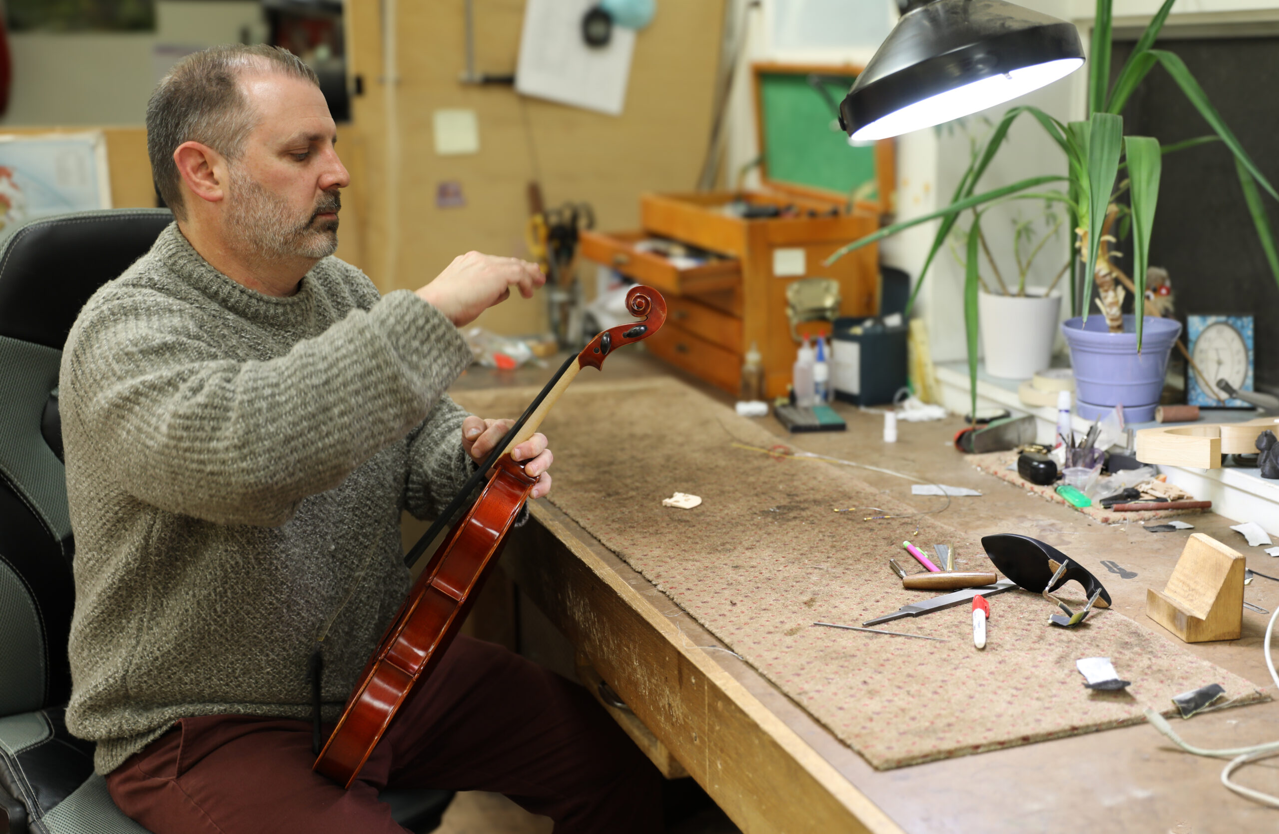 Luthier Ryan Bodiford In His Studio At Shar Music In Ann Arbor.