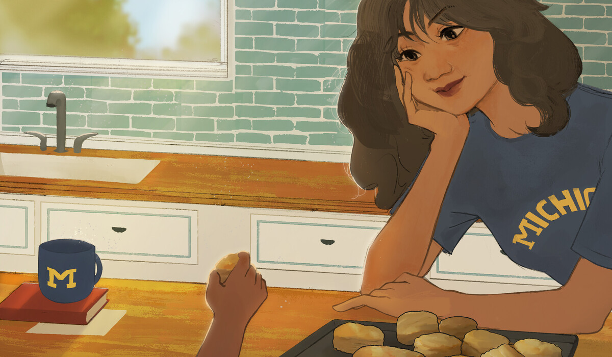 Digital painting of Anita, in a U-M shirt, looking down lovingly at her child as they take a freshly baked biscuit