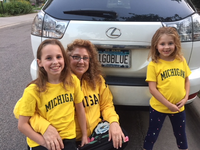 To keep U-M with her at all times in Minnesota, Saralyn Klein, ’86, MD’90, secured this license plate, which also helps inspire her daughters, Rebecca and Madeline, to become Wolverines.