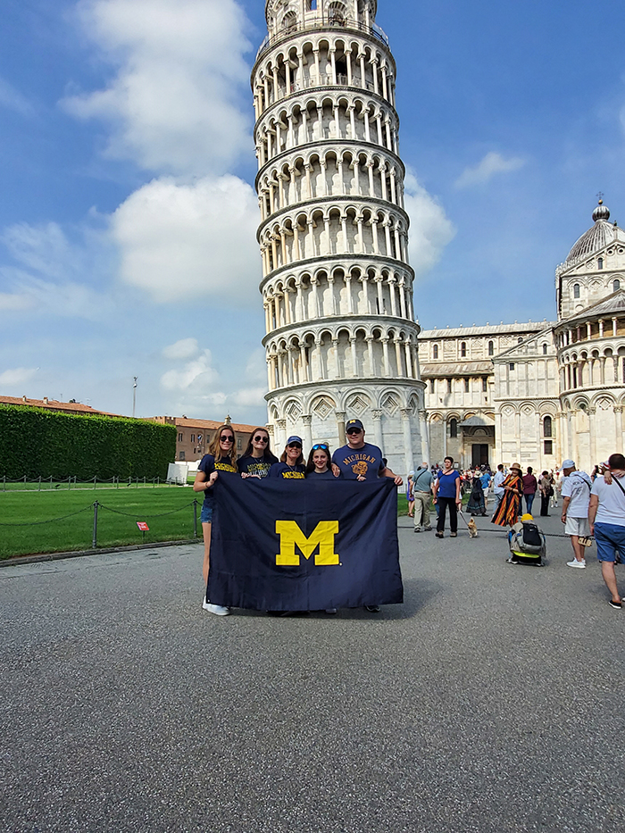 The Snyder family gave their own angle on Wolverine pride to the Leaning Tower of Pisa, Italy. Pictured are Anne, ’95, Justin, ’94, and daughters Mary, Shannon, and Makayla, an incoming U-M freshman.