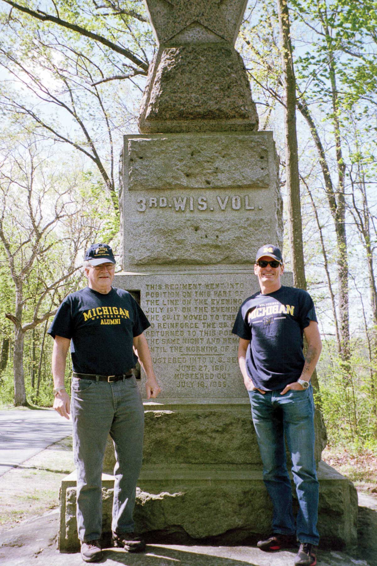 Steven Bartholomew, ’70, at left, with his sons Wade and Todd (off-camera), visited the 3rd Wisconsin Volunteer Infantry Monument on Culp’s Hill in Pennsylvania. Their ancestor, Samuel Bartholomew, served with this Union regiment at the 1863 Battle of Gettysburg.
