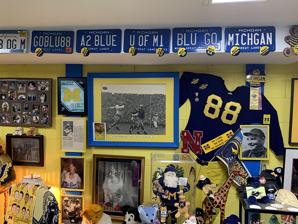 The basement in the East Lansing, Michigan, home of Susan Allis, ’56, is a shrine to the University and her now-deceased husband, Harry Allis, ’51, MD’59. Harry was a football player who led U-M to two national championships as well as the 1950 Snow Bowl and 1951 Rose Bowl. But it is their collection of expired family license plates (three of the four Allis children attended U-M) that dazzles. With more than 20 lining the room, those pictured are just a sampling of the plates on display, which includes the backward UL B OG that their son bought in California when GO BLUE was taken.