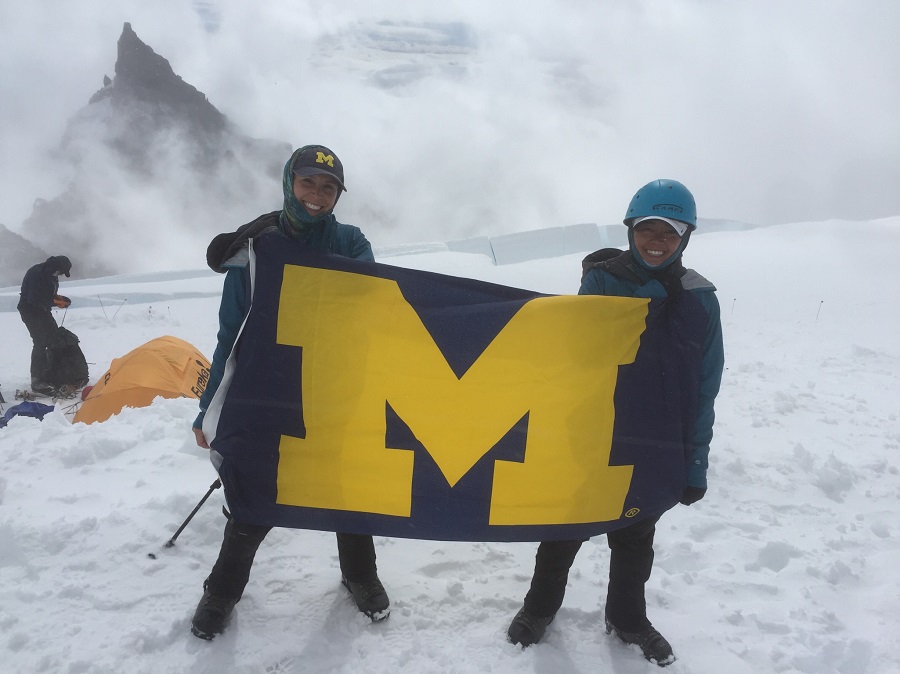 Lauren Triana, ’04, and Tyra Saechao, ’04, climbing Mount Rainier in Washington in July 2016.