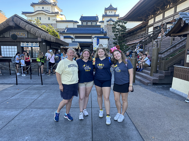 Alicia Urbain, ’96, and current U-M students Genevieve Urbain, Lucy Gibson, and Charlotte Gibson took their U-M pride to the Japan Pavilion at EPCOT at the Walt Disney World Resort in Florida.