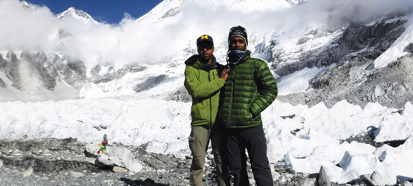Omar Davidson, x’89, (left) and his son, Omar II, took the father-son trip of a lifetime last October when they trekked to Mount Everest’s South Base Camp in Nepal, an approximate altitude of 17,600 feet. The senior Davidson is a 2015 inductee of the U-M Men's Track and Field Hall of Fame, having won two Big Ten championships. In fact, his school records in the indoor 4x400-meter relay, indoor 4x800-meter relay, and outdoor 4x800-meter relay stand to this day.