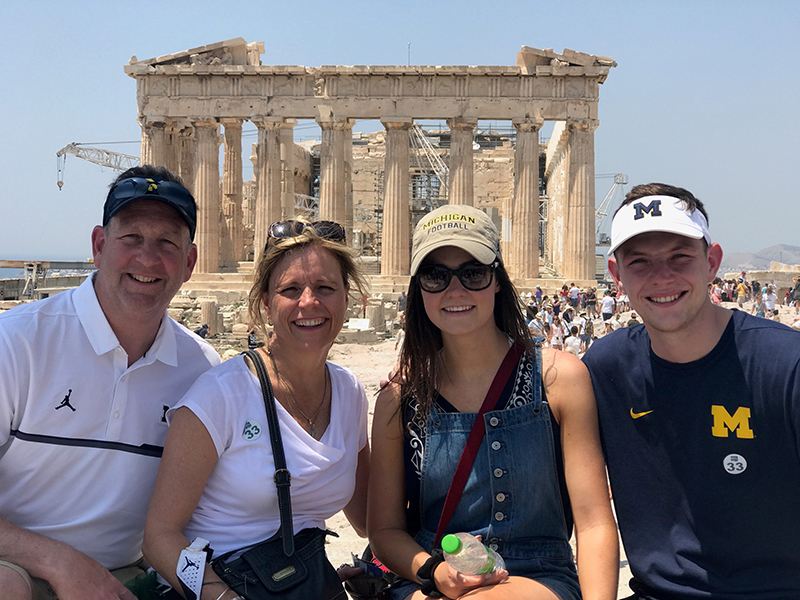 The Cronyn family, visiting the Acropolis in Athens, Greece. From left to right: Tim, ’85; Mary; Erin, ’16, MACC’17; Jack, currently a U-M student.