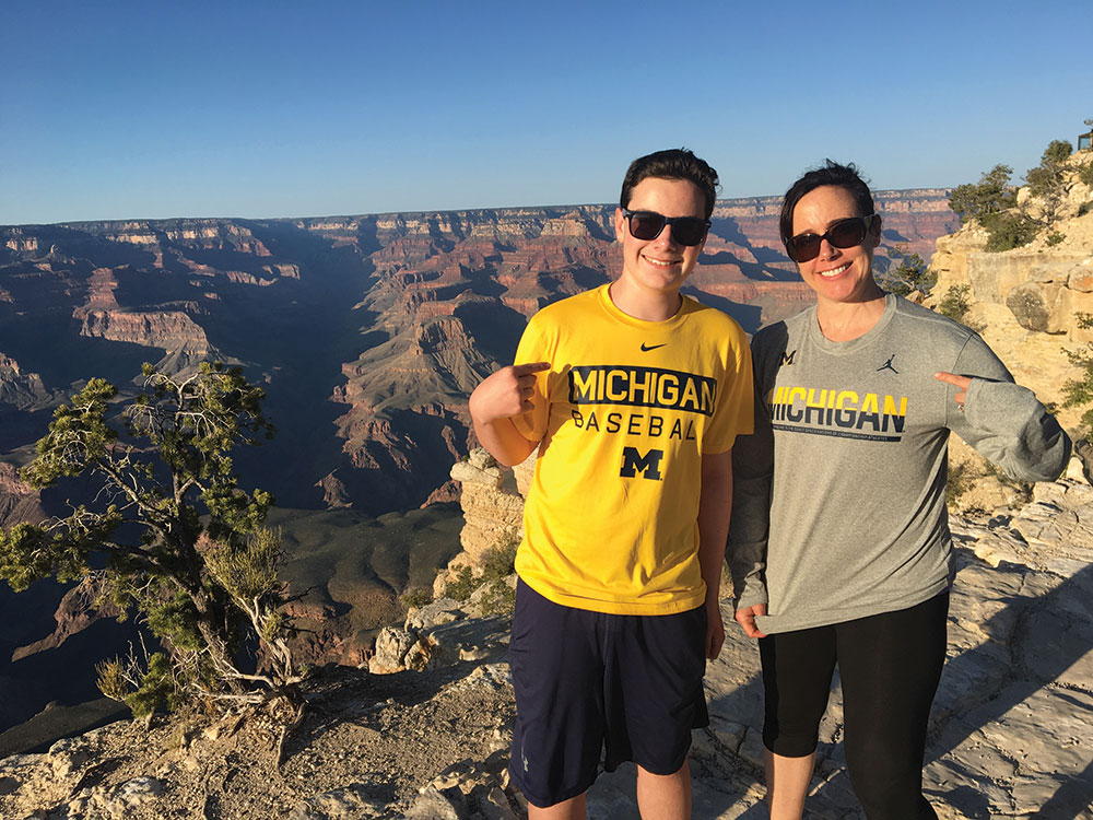 Valerie Edelman Gordon, ’93, and her Wolverine-fan son, Noah, took in the Grand Canyon after biking 25 miles of the South Rim in April.