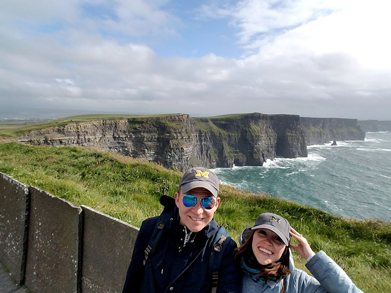 Chuck Guzak, ’06, and Rachel Prior, ’08, first met at the Michigan vs. Penn State football game in 2006. In this photo, they visit the Cliffs of Moher in County Clare, Ireland. The next day, they got married!