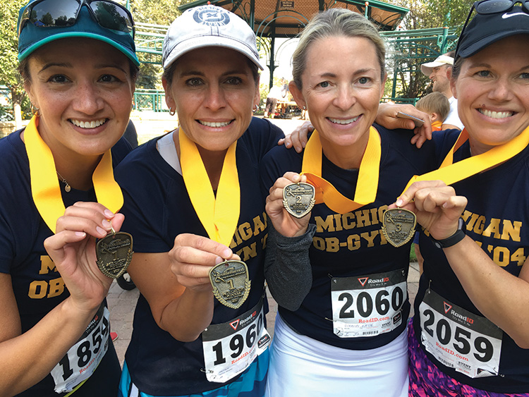 OB-GYN residency classmates were proud to “push through the pain” at a 10-mile marathon in Boulder, Colorado. From left are Laura Morrison, MD’99, MPH’00, MDRES’04; Mary Ellen Wechter, ’96, MDRES’04; Katie Goralski, ’94, MDRES’04; and Jessica Lalley, ’95, MDRES’04.