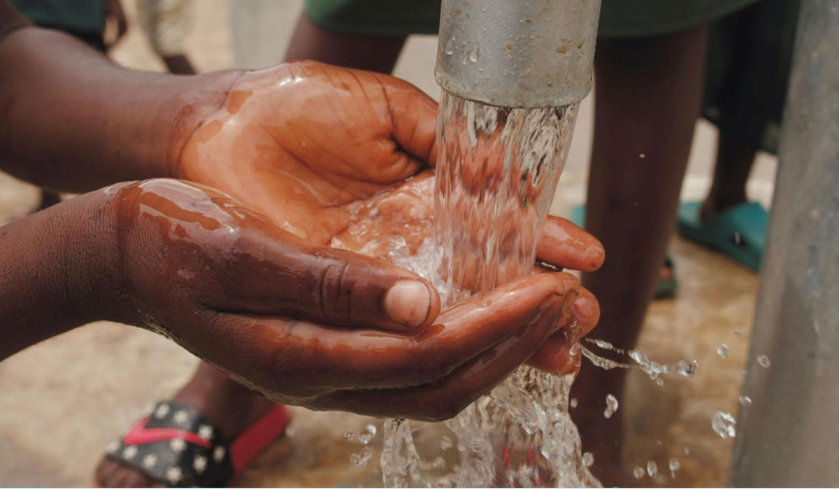 Washing 20hands 20in 20water 20pump