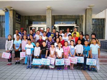 CBCF alumni volunteers present gifts and scholarship funds to students in China